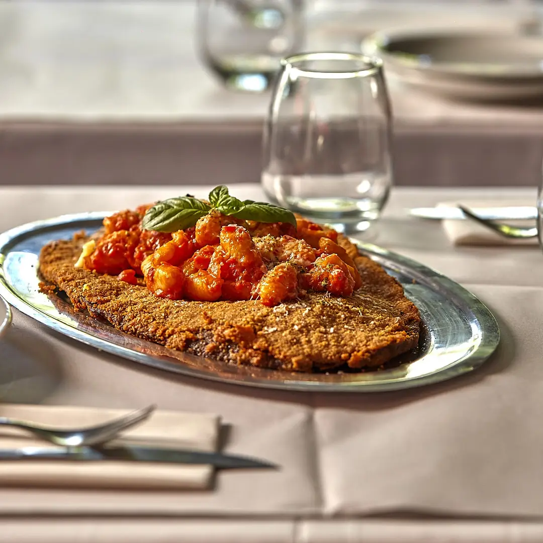 Milanesa con ñoquis